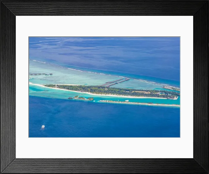Framed Print : Amazing aerial view of Maldives island and beach. Drone or airplane view of atoll and island and sea Framed Print : Amazing aerial view of Maldives island and beach. Drone or airplane view of atoll and island and sea