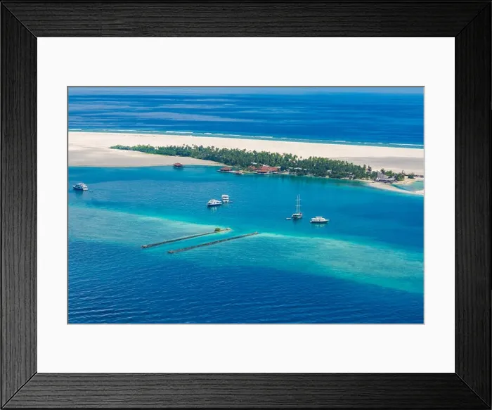 Framed Print : Amazing aerial view of Maldives island and beach. Drone or airplane view of atoll and island and sea Framed Print : Amazing aerial view of Maldives island and beach. Drone or airplane view of atoll and island and sea