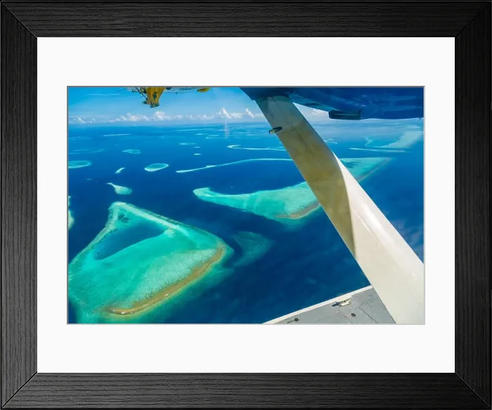 Framed Print : Amazing aerial view of Maldives island and beach. Drone or airplane view of atoll and island and sea Framed Print : Amazing aerial view of Maldives island and beach. Drone or airplane view of atoll and island and sea