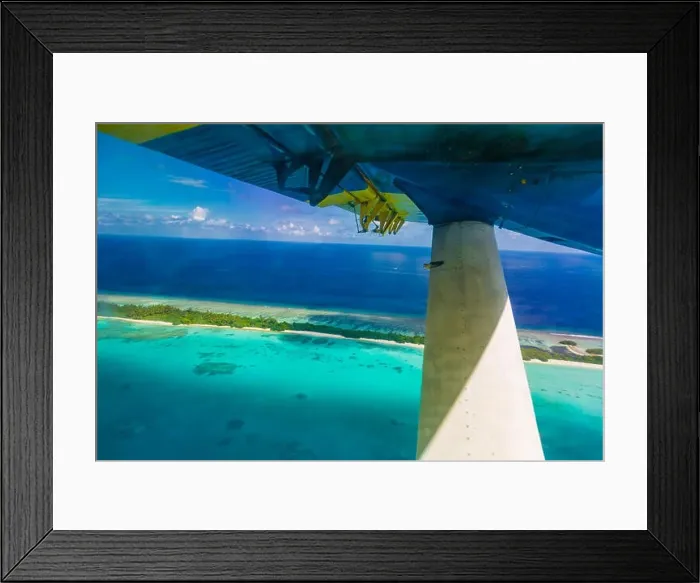 Framed Print : Amazing aerial view of Maldives island and beach. Drone or airplane view of atoll and island and sea Framed Print : Amazing aerial view of Maldives island and beach. Drone or airplane view of atoll and island and sea