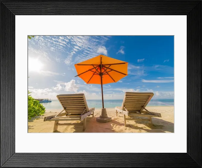 Framed Print : Vacation in tropical countries. Beach chairs, umbrella and palms on the beach Framed Print : Vacation in tropical countries. Beach chairs, umbrella and palms on the beach