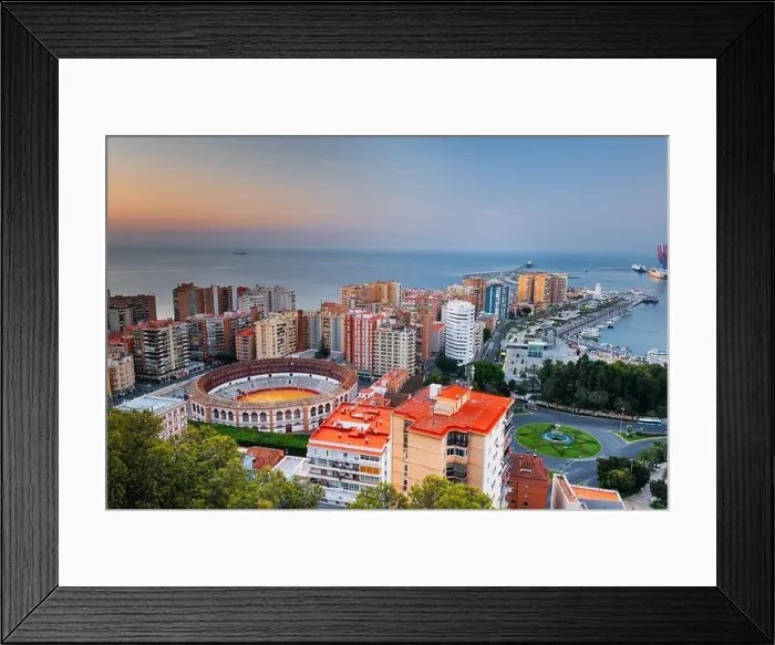 Framed Print : Malaga, Spain dawn skyline towards the Mediterranean Sea at dusk Framed Print : Malaga, Spain dawn skyline towards the Mediterranean Sea at dusk