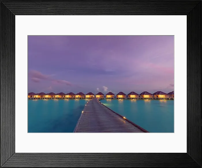Framed Print : Maldives island sunset. Water bungalows resort at islands beach. Indian Ocean, Maldives. Beautiful sunset landscape, luxury resort and colorful sky Framed Print : Maldives island sunset. Water bungalows resort at islands beach. Indian Ocean, Maldives. Beautiful sunset landscape, luxury resort and colorful sky