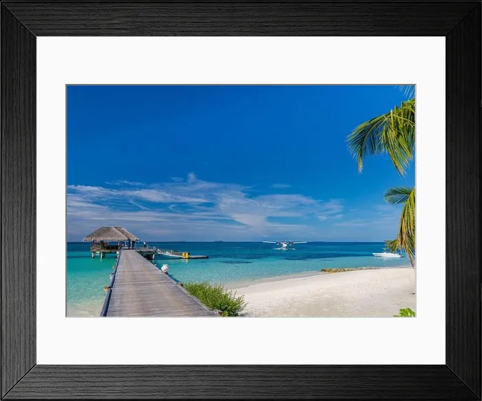 Framed Print : Maldives island beach. Tropical landscape of summer scenery, sea sand sky over jetty pier. Luxury travel vacation destination. Exotic beach landscape Framed Print : Maldives island beach. Tropical landscape of summer scenery, sea sand sky over jetty pier. Luxury travel vacation destination. Exotic beach landscape