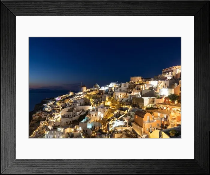 Framed Print : Stunning night view of fabulous caldera view, picturesque village of Oia with traditional white houses under sunset. Amazing travel vacation landscape Framed Print : Stunning night view of fabulous caldera view, picturesque village of Oia with traditional white houses under sunset. Amazing travel vacation landscape