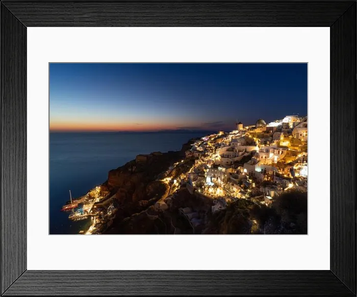 Framed Print : Stunning night view of fabulous caldera view, picturesque village of Oia with traditional white houses under sunset. Amazing travel vacation landscape Framed Print : Stunning night view of fabulous caldera view, picturesque village of Oia with traditional white houses under sunset. Amazing travel vacation landscape