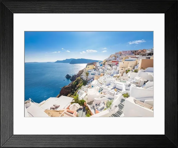 Framed Print : Greece, Santorini island beautiful panorama. Scenic view of traditional cycladic white houses and blue domes in Oia village, Santorini island, Greece