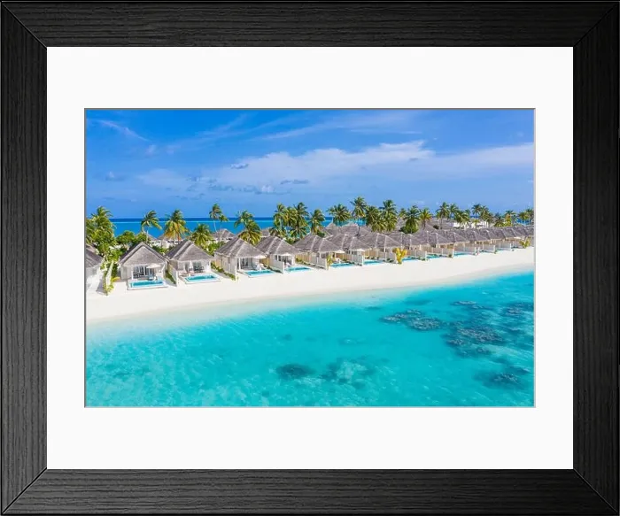 Framed Print : Perfect aerial landscape, luxury tropical resort or hotel with water villas and beautiful beach scenery. Amazing bird eyes view in Maldives, landscape