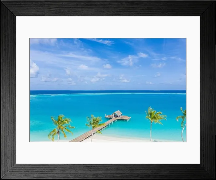 Framed Print : Luxury bay and beach from aerial top view, amazing beachfront, swimming pool on tropical island beach. Palm trees in sunlight, beautiful blue ocean Framed Print : Luxury bay and beach from aerial top view, amazing beachfront, swimming pool on tropical island beach. Palm trees in sunlight, beautiful blue ocean