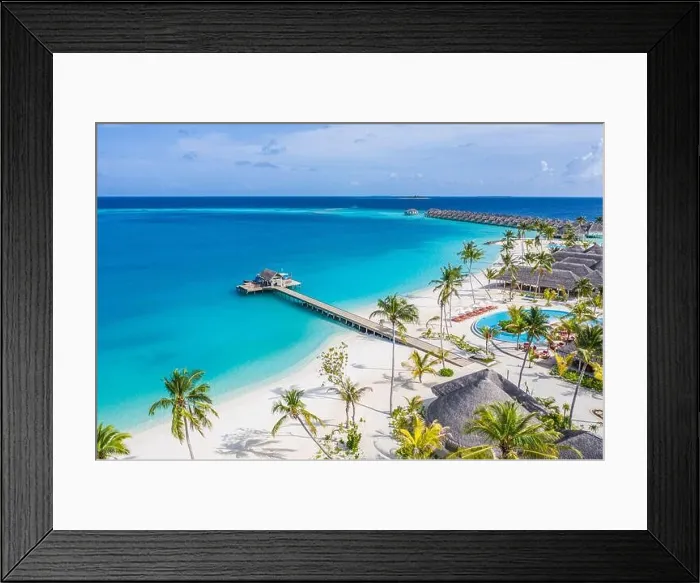 Framed Print : Beautiful aerial view of poolside and resort beach with wooden pier jetty. Luxurious tropical hotel landscape swimming pool deck chairs loungers palms Framed Print : Beautiful aerial view of poolside and resort beach with wooden pier jetty. Luxurious tropical hotel landscape swimming pool deck chairs loungers palms