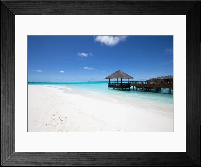 Framed Print : Maldives island beach. Tropical landscape of summer scenery, sea sand sky over jetty pier. Luxury travel vacation destination. Exotic beach landscape Framed Print : Maldives island beach. Tropical landscape of summer scenery, sea sand sky over jetty pier. Luxury travel vacation destination. Exotic beach landscape