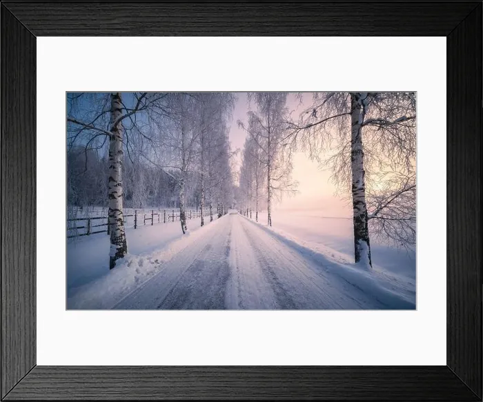 Framed Print : Scenic snow landscape with beautiful sunrise and snowy road at winter morning in Finland Framed Print : Scenic snow landscape with beautiful sunrise and snowy road at winter morning in Finland
