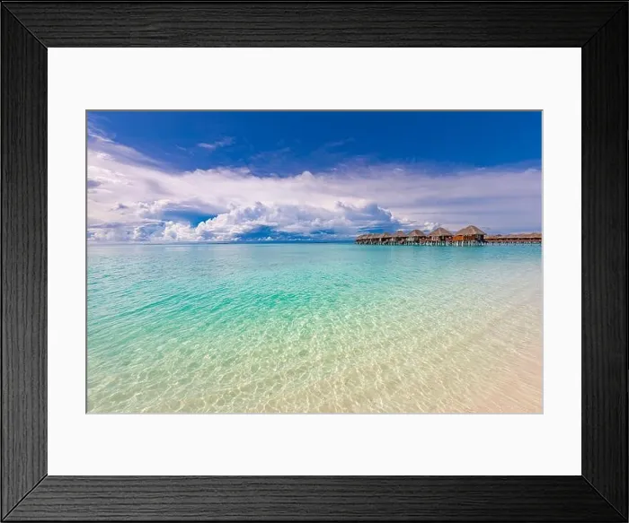 Framed Print : Tropical beach with water bungalows on the Maldives. Amazing shore coastline, sea view with luxury water villas and bungalows. Stunning sunny beach Framed Print : Tropical beach with water bungalows on the Maldives. Amazing shore coastline, sea view with luxury water villas and bungalows. Stunning sunny beach