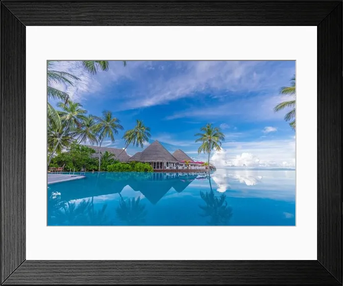 Framed Print : Summer luxury tourism landscape. Luxurious beach resort swimming pool reflection and beach chairs loungers, umbrellas palm trees blue sky poolside Framed Print : Summer luxury tourism landscape. Luxurious beach resort swimming pool reflection and beach chairs loungers, umbrellas palm trees blue sky poolside