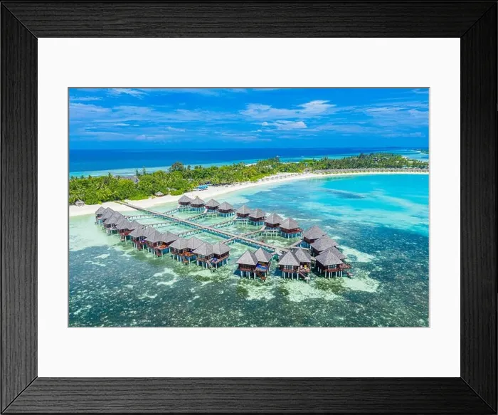 Framed Print : Maldives paradise scenery. Tropical aerial landscape, seascape with long jetty water villas with amazing sea and lagoon beach, tropical nature. Exotic Framed Print : Maldives paradise scenery. Tropical aerial landscape, seascape with long jetty water villas with amazing sea and lagoon beach, tropical nature. Exotic