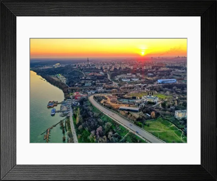 Framed Print : Aerial view of Galati City, Romania. Danube River near city with sunset warm light Framed Print : Aerial view of Galati City, Romania. Danube River near city with sunset warm light