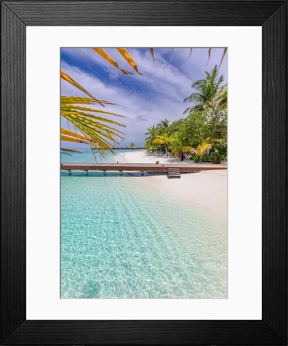 Framed Print : Wooden pier bridge at tropical beach in the Maldives. Palm tree leaves with amazing sea lagoon. Idyllic nature view Framed Print : Wooden pier bridge at tropical beach in the Maldives. Palm tree leaves with amazing sea lagoon. Idyllic nature view