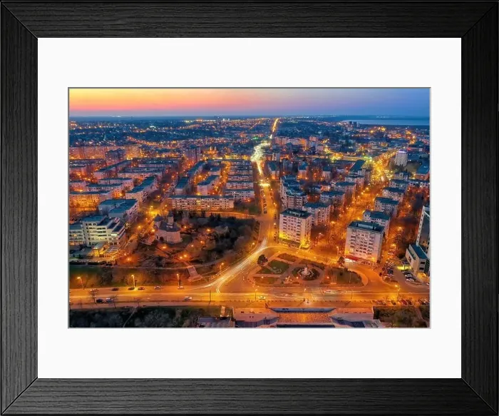 Framed Print : Aerial view of Galati City, Romania. Danube River near city with sunset warm light