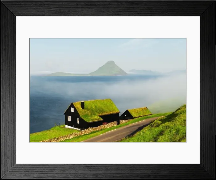 Framed Print : Foggy morning view of a house with typical turf-top grass roof in the Velbastadur village on Streymoy island, Faroe islands, Denmark. Landscape photog Framed Print : Foggy morning view of a house with typical turf-top grass roof in the Velbastadur village on Streymoy island, Faroe islands, Denmark. Landscape photog