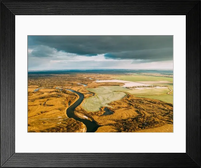 Framed Print : Aerial View Of Dry Grass And Partly Frozen River Landscape In Late Autumn Day. High Attitude View. Marsh Bog. Drone View. Bird's Eye View