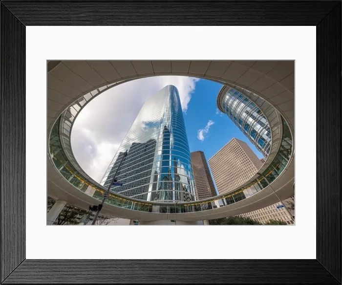 Framed Print : HOUSTON, TEXAS - JANUARY 28, 2018: The circular walkway of the Chevron Building in downtown Houston Framed Print : HOUSTON, TEXAS - JANUARY 28, 2018: The circular walkway of the Chevron Building in downtown Houston