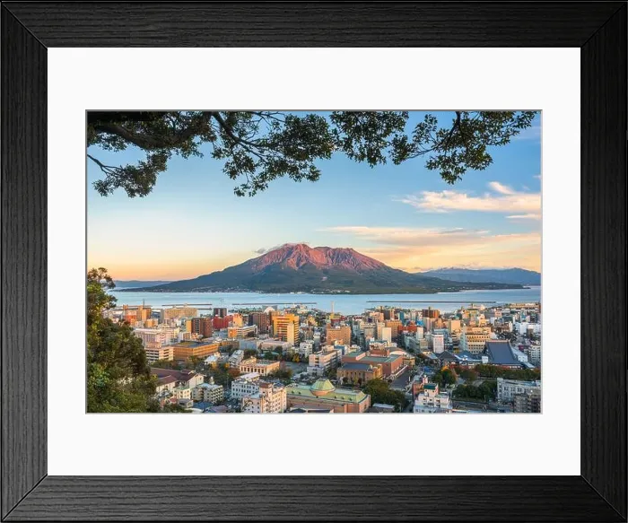 Framed Print : Kagoshima, Japan skyline with Sakurajima Volcano at dusk Framed Print : Kagoshima, Japan skyline with Sakurajima Volcano at dusk