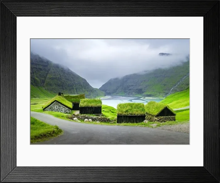 Framed Print : Beauty landscape with grassy houses and high mountains near famous church Saksunar Kirkja in Saksun village. Streymoy island, Faroe Islands, Denmark Framed Print : Beauty landscape with grassy houses and high mountains near famous church Saksunar Kirkja in Saksun village. Streymoy island, Faroe Islands, Denmark