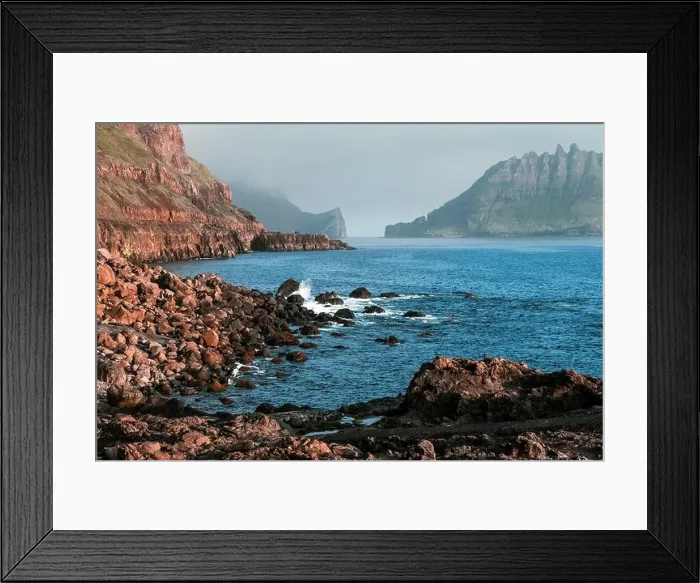 Framed Print : Dramatic view on Drangarnir and Tindholmur sea stacks in Atlantic ocean from Gasadalur village on Vagar island, Faroe Islands. Landscape photography Framed Print : Dramatic view on Drangarnir and Tindholmur sea stacks in Atlantic ocean from Gasadalur village on Vagar island, Faroe Islands. Landscape photography
