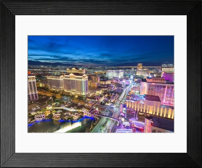 Framed Print : LAS VEGAS, NEVADA - MAY 13, 2019: Hotels and Casinos along the strip at dusk Framed Print : LAS VEGAS, NEVADA - MAY 13, 2019: Hotels and Casinos along the strip at dusk
