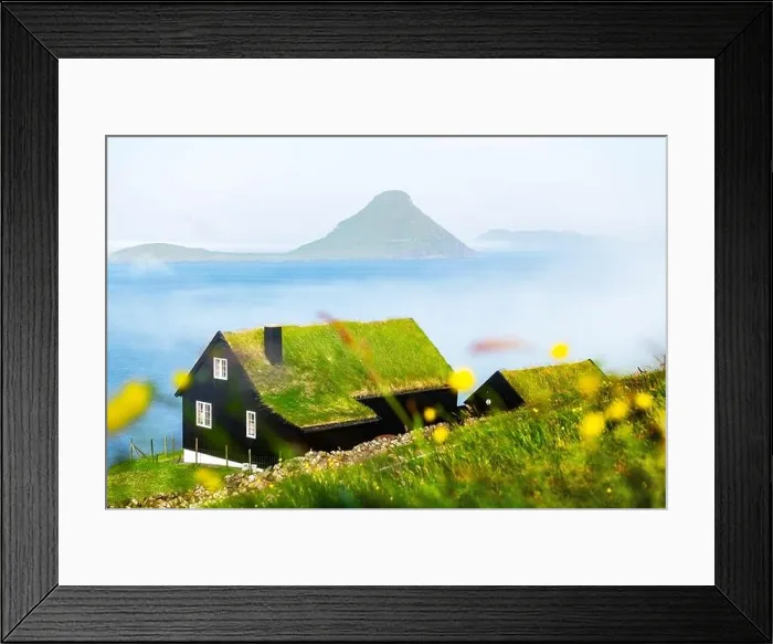Framed Print : Foggy morning view of a house with typical turf-top grass roof in the Velbastadur village on Streymoy island, Faroe islands, Denmark. Landscape photog