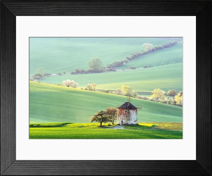 Framed Print : Gorgeous rural landscape with old windmill and green sunny spring hills. South Moravia region, Czech Republic Framed Print : Gorgeous rural landscape with old windmill and green sunny spring hills. South Moravia region, Czech Republic