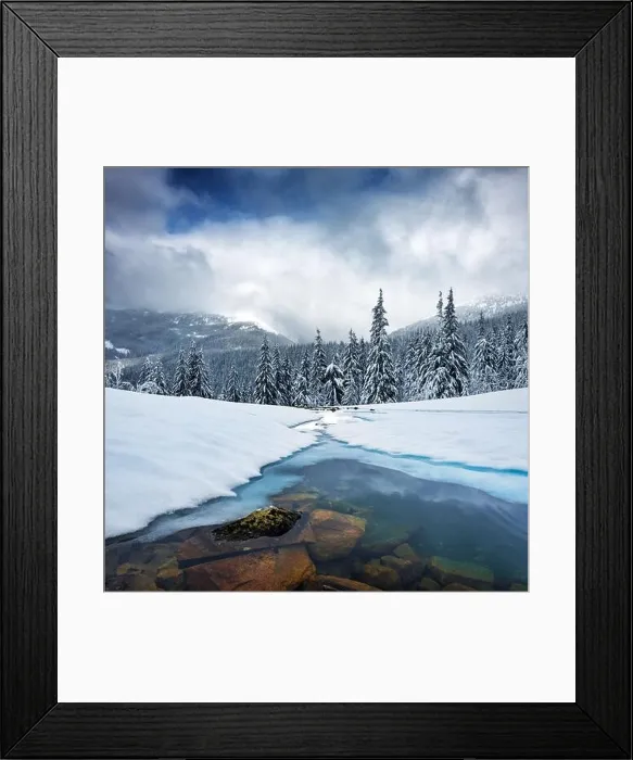 Framed Print : Fantastic winter landscape with frozen river and snowy trees in foggy mountains. Carpathian mountains, Ukraine, Europe. Christmas holiday concept Framed Print : Fantastic winter landscape with frozen river and snowy trees in foggy mountains. Carpathian mountains, Ukraine, Europe. Christmas holiday concept