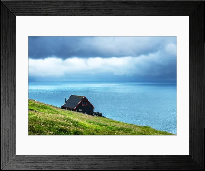 Framed Print : Black house on famous faroese Witches Finger Trail Framed Print : Black house on famous faroese Witches Finger Trail
