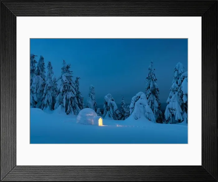 Framed Print : Snow igloo luminous from the inside in the winter mountains. Snow-covered firs in the evening light in the background. Landscape photography Framed Print : Snow igloo luminous from the inside in the winter mountains. Snow-covered firs in the evening light in the background. Landscape photography