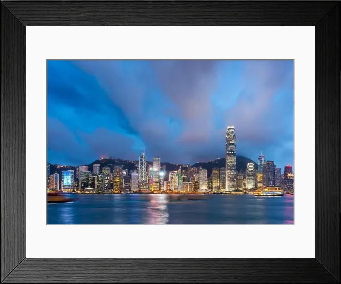Framed Print : Hong Kong, China downtown cityscape from the harbor at dusk Framed Print : Hong Kong, China downtown cityscape from the harbor at dusk