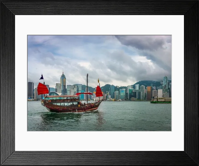 Framed Print : Hong Kong, China downtown cityscape from the harbor at dusk Framed Print : Hong Kong, China downtown cityscape from the harbor at dusk