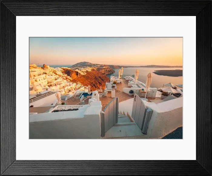 Framed Print : Beautiful sunset at Santorini island, Greece. Chairs on the terrace with sea view. Travel destinations concept. Summer vacation landscape Framed Print : Beautiful sunset at Santorini island, Greece. Chairs on the terrace with sea view. Travel destinations concept. Summer vacation landscape