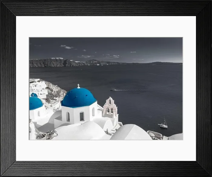 Framed Print : Selective color image, blue color with black and white process. Oia view in Santorini, caldera and blue church dome. Idyllic, inspirational travel Framed Print : Selective color image, blue color with black and white process. Oia view in Santorini, caldera and blue church dome. Idyllic, inspirational travel