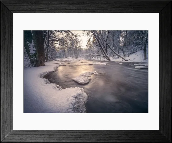 Framed Print : Scenic winter landscape with flowing river and morning light in Finland. Snowy trees Framed Print : Scenic winter landscape with flowing river and morning light in Finland. Snowy trees