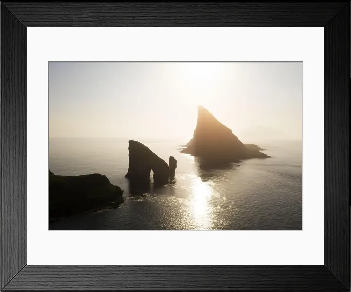 Framed Print : Aerial drone flying over Drangarnir and Tindholmur sea stacks Framed Print : Aerial drone flying over Drangarnir and Tindholmur sea stacks