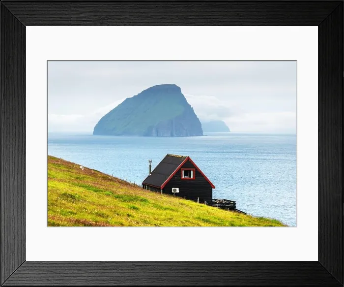 Framed Print : Black house on famous faroese Witches Finger Trail Framed Print : Black house on famous faroese Witches Finger Trail