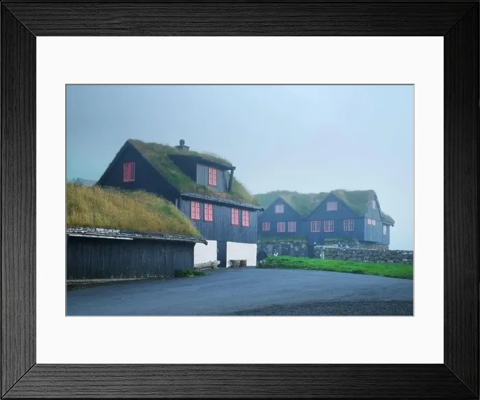 Framed Print : Foggy morning view of a house with typical grass roof