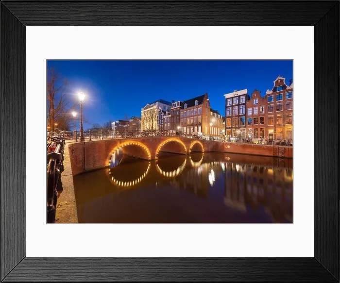 Framed Print : Amsterdam, Netherlands view of the cityscape on the canals at night Framed Print : Amsterdam, Netherlands view of the cityscape on the canals at night