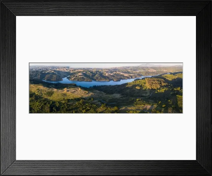 Framed Print : The last light of day illuminates the green, rolling hills just east of San Francisco Bay. This entire region turns green after winter storms Framed Print : The last light of day illuminates the green, rolling hills just east of San Francisco Bay. This entire region turns green after winter storms