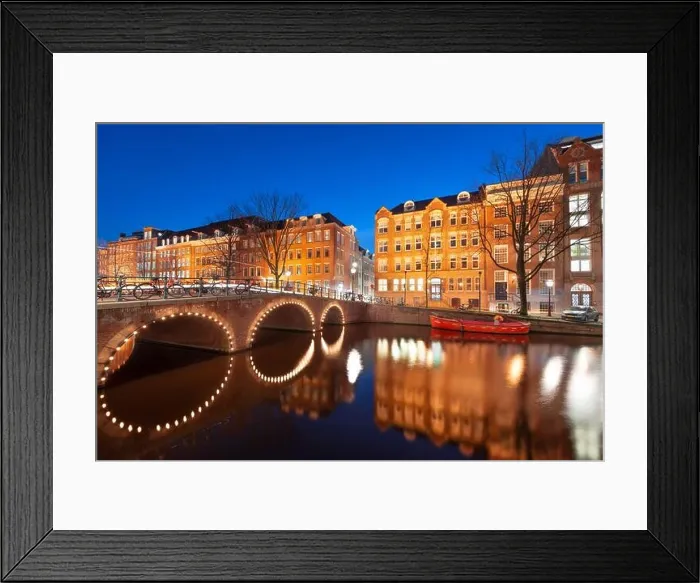 Framed Print : Amsterdam, Netherlands view of the cityscape on the canals at night Framed Print : Amsterdam, Netherlands view of the cityscape on the canals at night