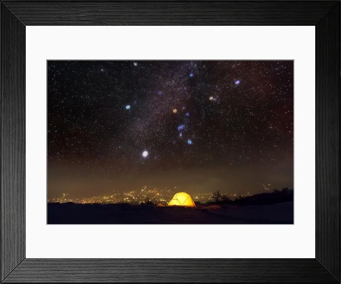 Framed Print : Yellow tent lighted from the inside against the backdrop of glowing city lights and incredible starry sky. Amazing night landscape Framed Print : Yellow tent lighted from the inside against the backdrop of glowing city lights and incredible starry sky. Amazing night landscape