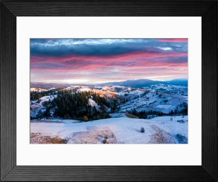 Framed Print : Amazing aerial view of mountains range and meadows of the countryside in spring time. Dramatic sky Framed Print : Amazing aerial view of mountains range and meadows of the countryside in spring time. Dramatic sky