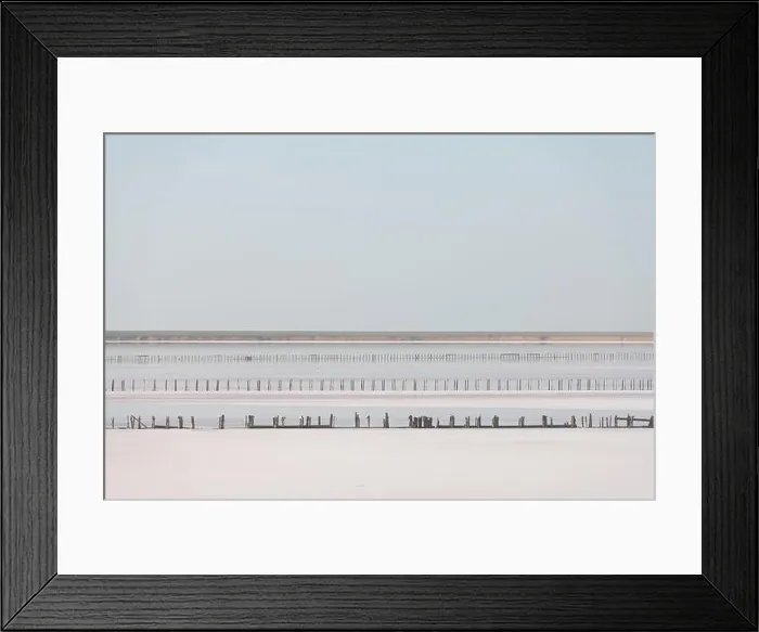 Framed Print : Tranquil minimalist landscape with smooth surface of the pink salt lake with wooden posts with clear sky in sunrise time Framed Print : Tranquil minimalist landscape with smooth surface of the pink salt lake with wooden posts with clear sky in sunrise time