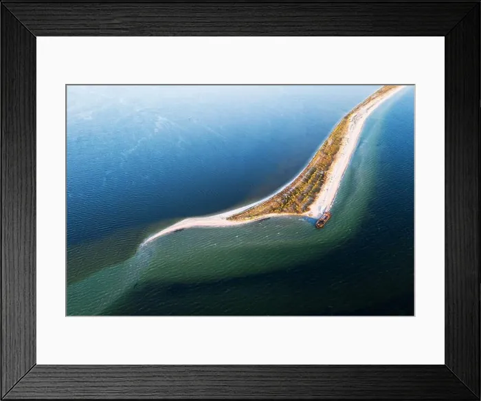 Framed Print : Old shipwreck reinforced concrete barge abandoned stand on beach on the coast of Black sea in Kinburn peninsula, Ukraine Framed Print : Old shipwreck reinforced concrete barge abandoned stand on beach on the coast of Black sea in Kinburn peninsula, Ukraine