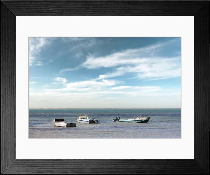 Framed Print : Old metal boats on clear Black sea water. Blue sky with clouds on background Framed Print : Old metal boats on clear Black sea water. Blue sky with clouds on background